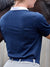 Back view of navy riding shirt